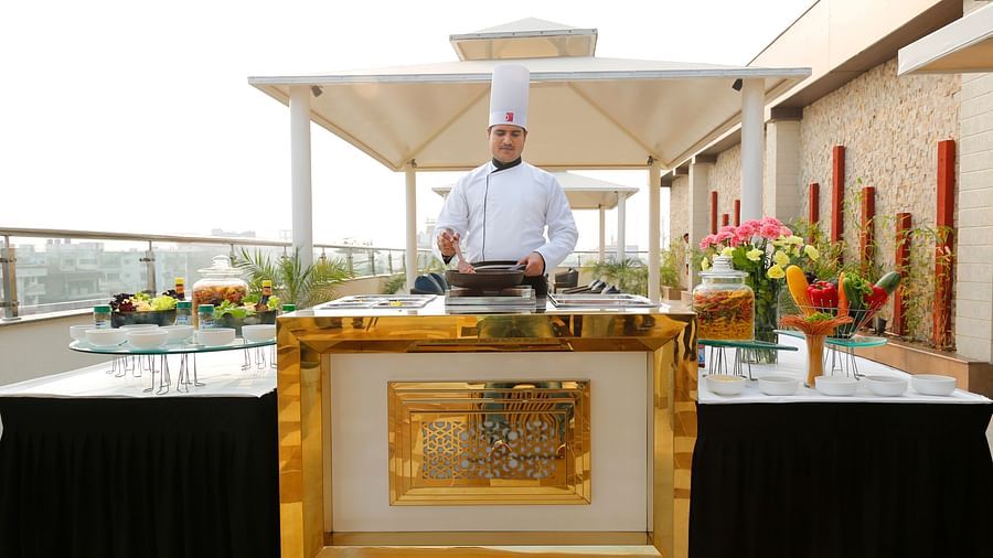 Sapna Clarks - a chef cooking at the rooftop 1