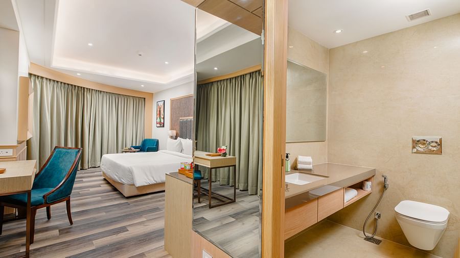 Spacious Junior Suite with separate living and sleeping area at Sarovar Portico, Ajmer.
