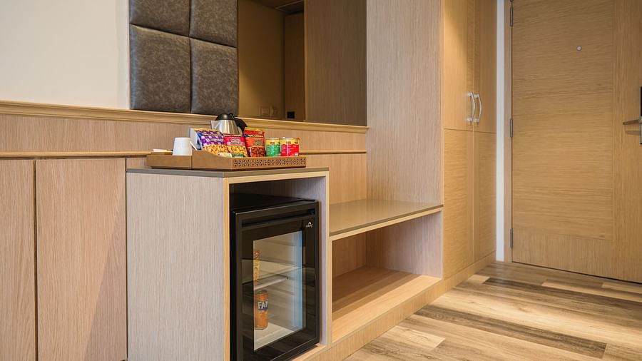 Mini-bar and storage area in the Superior Room at Sarovar Portico, Ajmer