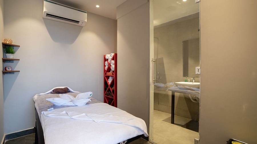 image of the spa featuring an air conditoned room with a wide bed at sibaya beach resort, morjim beach