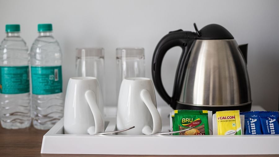 image of the in room amenities for garden suite that features an electric kettle along with packed water bottles