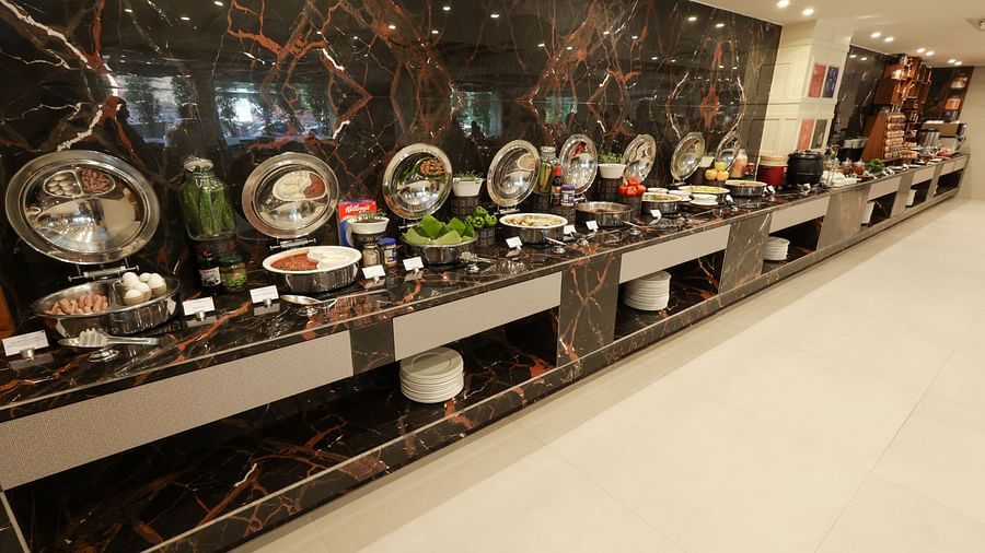 Food presented in a buffet style at Sobit Sarovar Portico, Goa