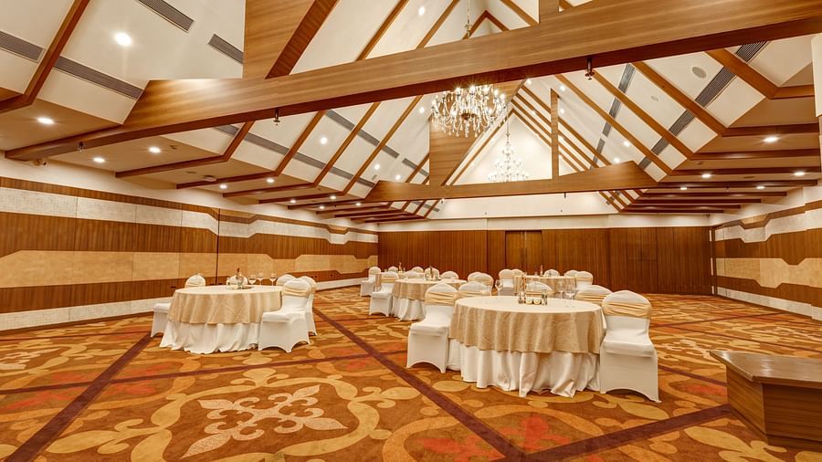 Indoor gathering space with chairs at Sobit Sarovar Portico, Goa
