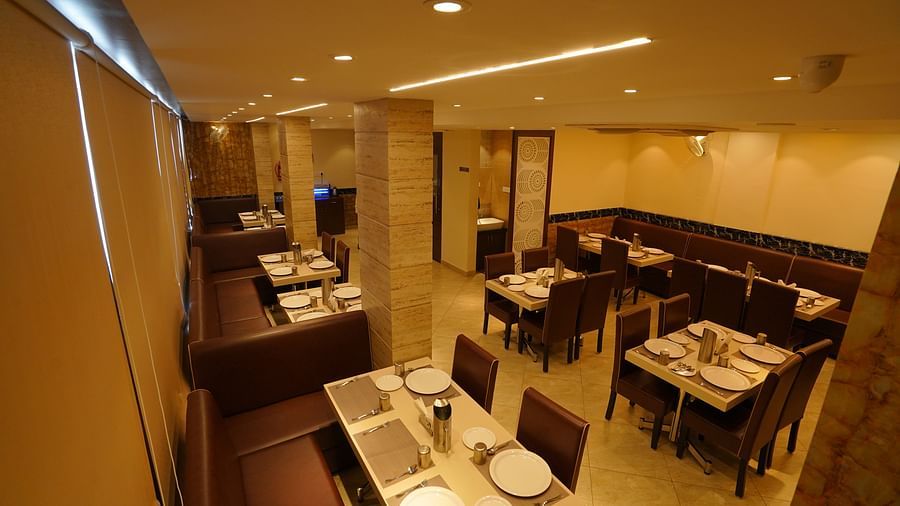 Seating arrangements of the restaurant at Springs Hotel Tirupati