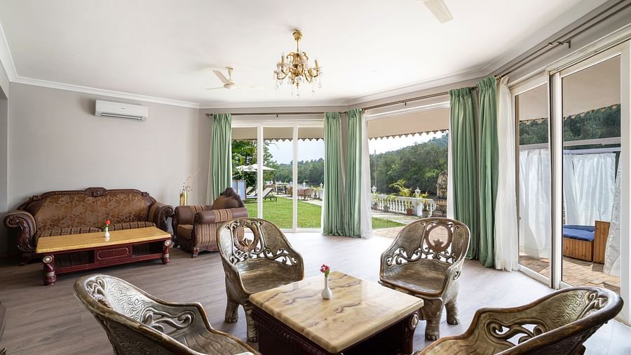 The sitting area of our maharaja Villa  1 - Stone Wood Riverfront Resort, Siolim