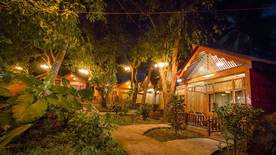 wooden cottages at night