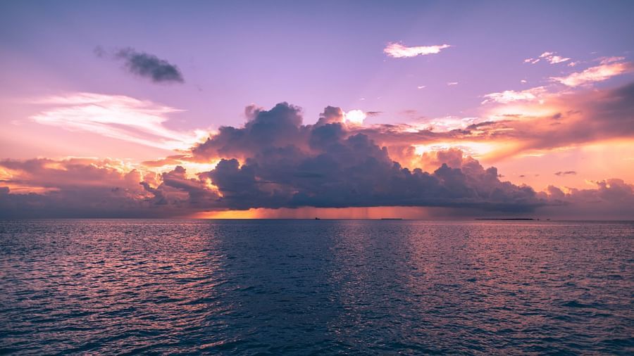Cloud over ocean during sunset