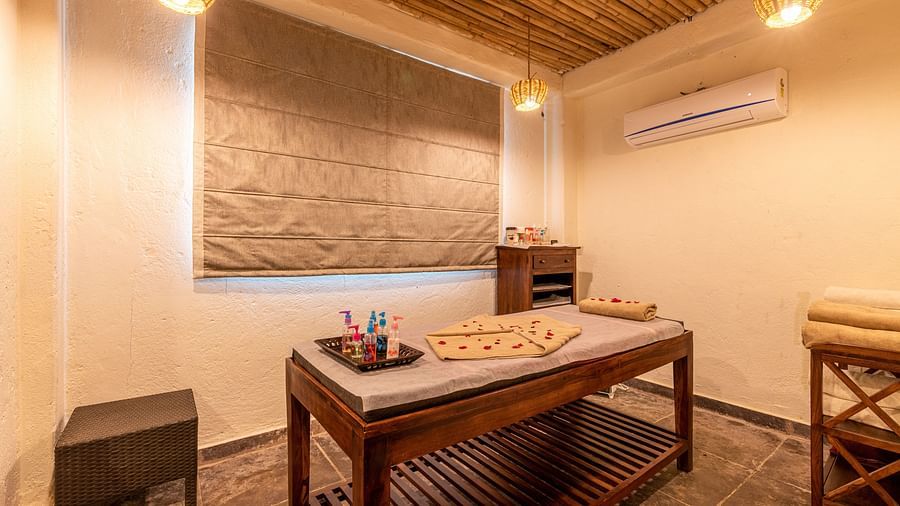 aromatic oils kept on a spa bed at the spa in Ranthambore at The Baagh Ananta Elite 1