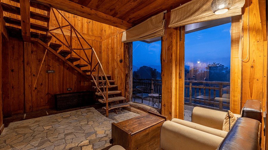 one of the duplex cottages in Ranthambore with a sofa set at one corner