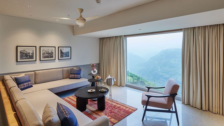 Image of a sitting area with a large window overlooking the valley at The Dukes Retreat.