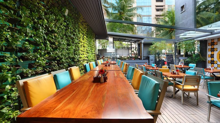 The Empresa Boutique Hotel - the colourful seats offered at Loca Loca Bistro in Andheri 2