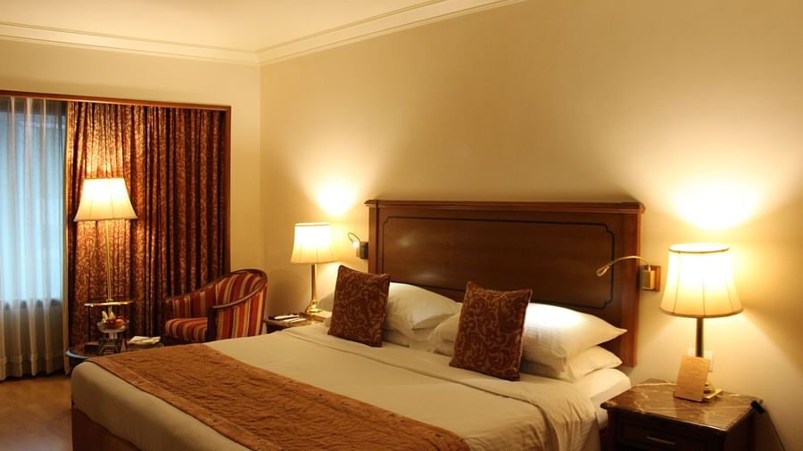 room with king size bed and warm lighting