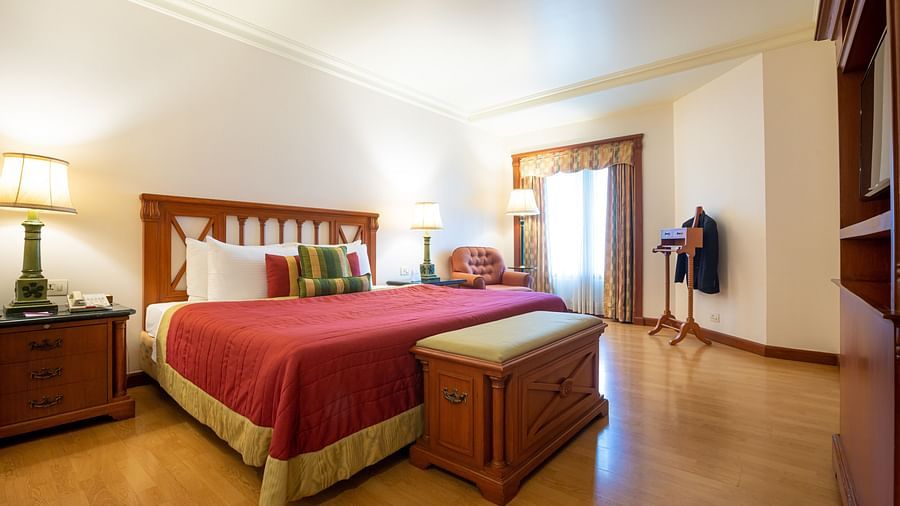 suite with a comfy bed and modern interiors - The Orchid Hotel Mumbai Vile Parle