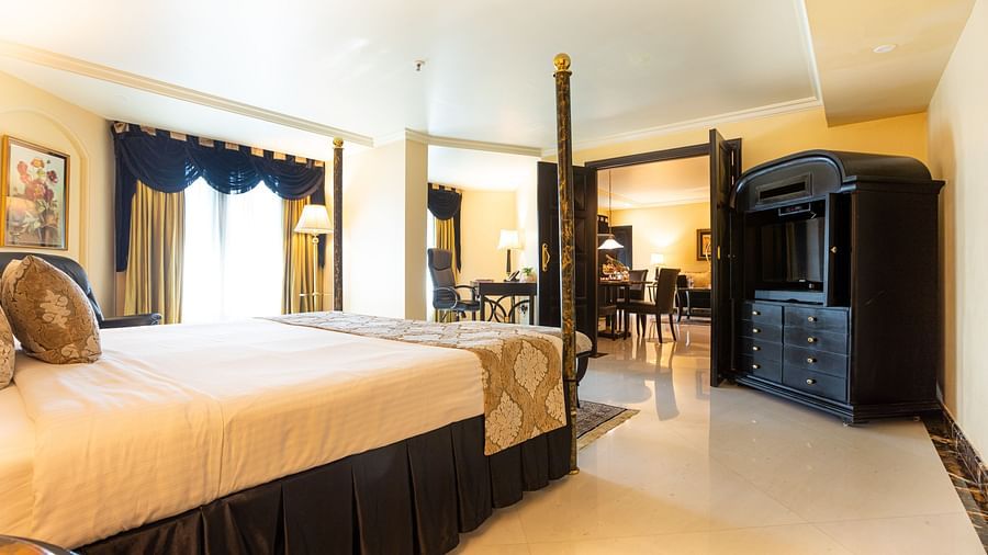 presidential suite with a commodious bed and elegant interiors - The Orchid Hotel Mumbai Vile Parle