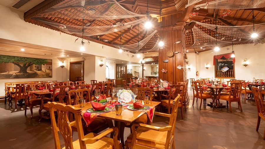 elegant interior of our south indian restaurant in vile parle - The Orchid Hotel Mumbai Vile Parle
