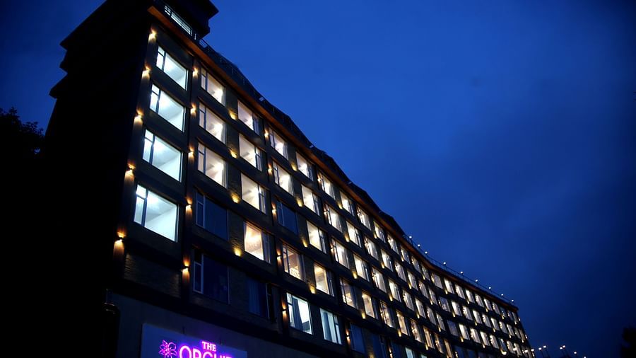 Facade with every window lit up at night- The Orchid Hotel Shimla
