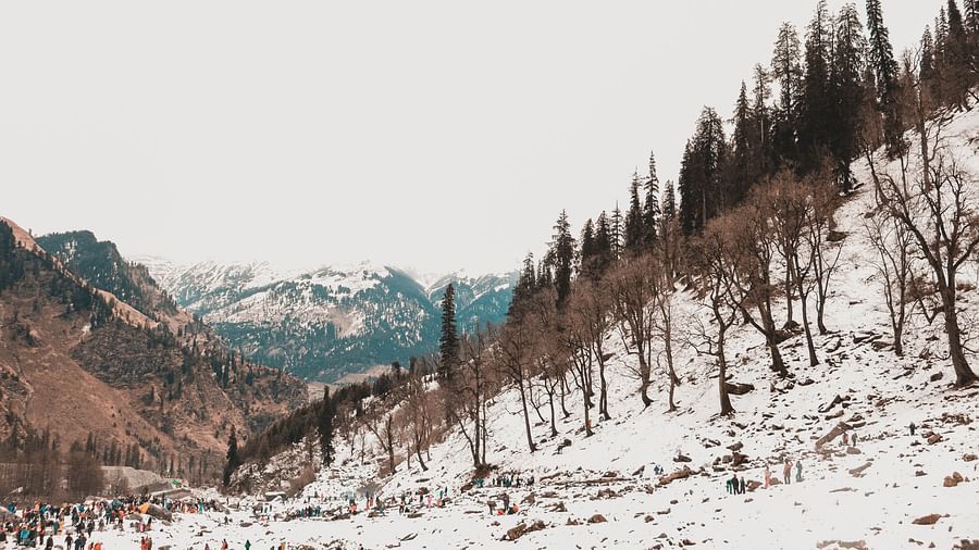 a snow-capped mountain range during daytime
