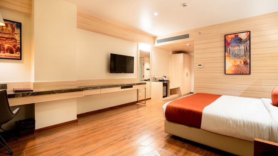 bedroom of Premier Room at The Orchid Lonavala 12