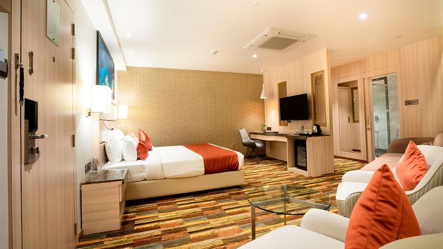 bedroom of one of the Junior Suites in Lonavala  at The Orchid Lonavala