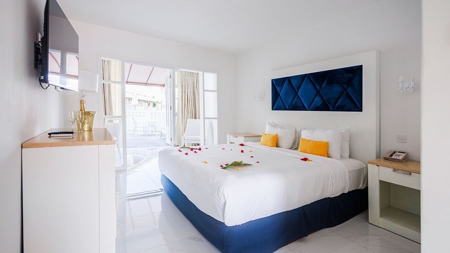 view of a king size bed facing the TV - The Soco House 2