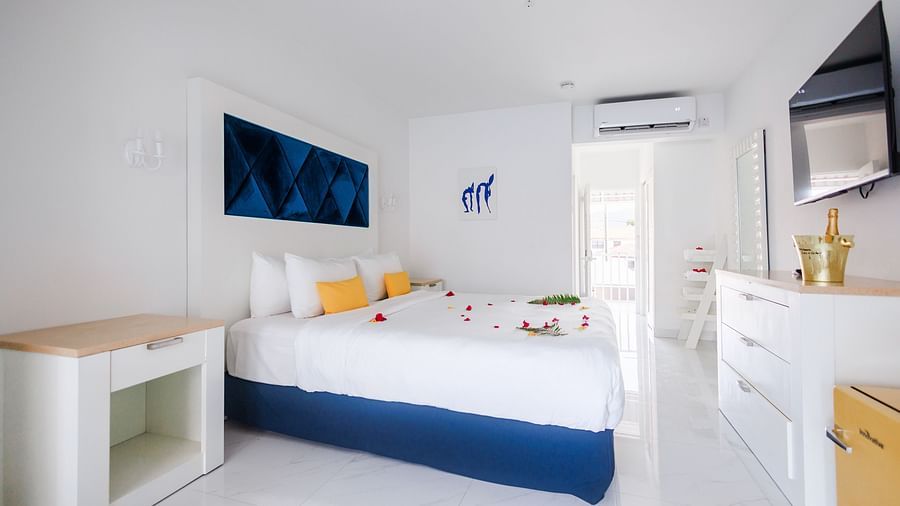 view of a king size bed facing the TV - The Soco House 1
