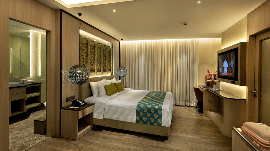 Premium suite with bedroom, lounge area and elegant design at The Sonnet, Jamshedpur.