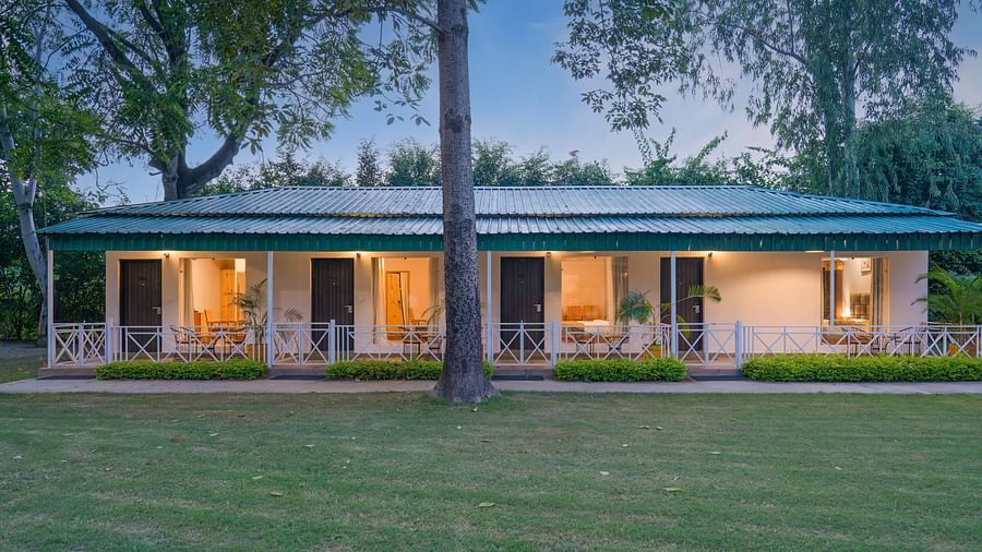 Garden-facing cottages at The Tattwaa Corbett Spa & Resort.