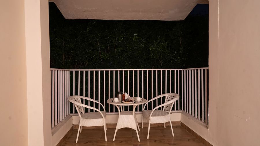 Private balcony seating at The Tattwaa Corbett Spa & Resort.