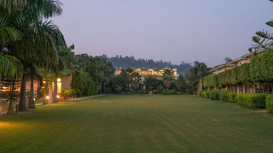 Expansive green lawn at The Tattwaa Corbett Spa & Resort.