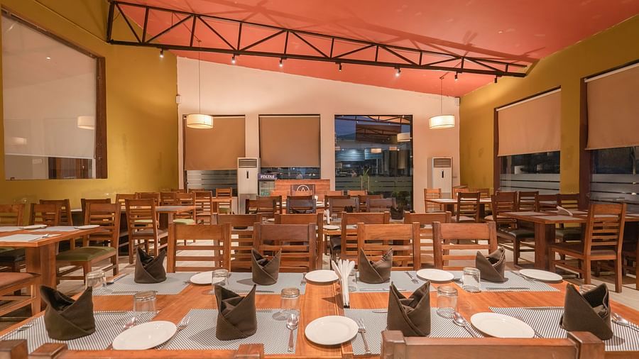 Cosy restaurant interior at The Tattwaa Corbett Spa & Resort.