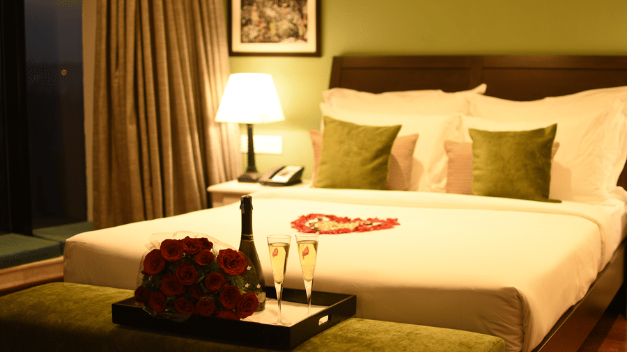 valentines day room decor with flowers and wine