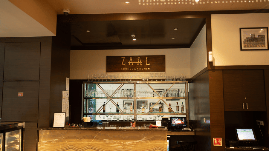 Bar counter with curated spirits display at Zaal Lounge & Kitchen, Whitefield Bengaluru