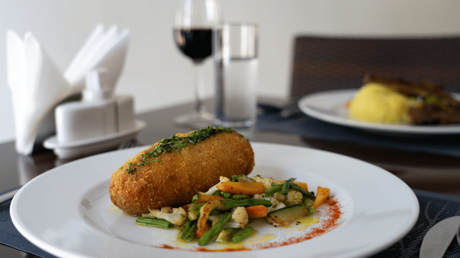 Gourmet crumbed fish dish served at the restaurant at The Zehneria, Nairobi