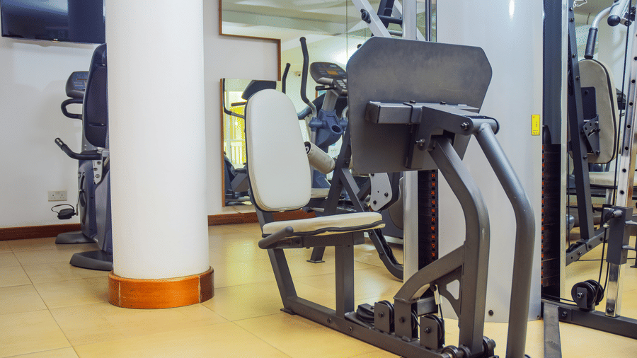 A close up of the machines inside the gym at The Zehneria, Nairobi featuring cardio and strength training equipment.