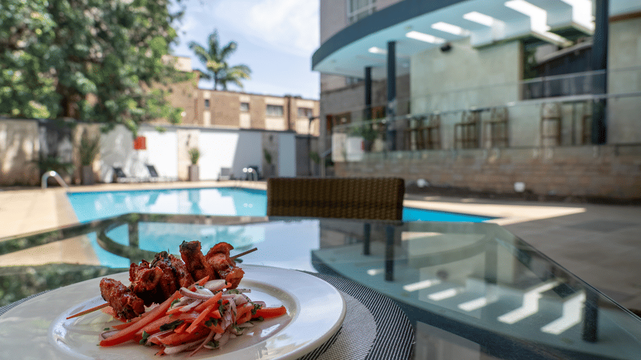 An appetiser plate served on a dining table by the side of the swimming pool at The Zehneria, Nairobi.