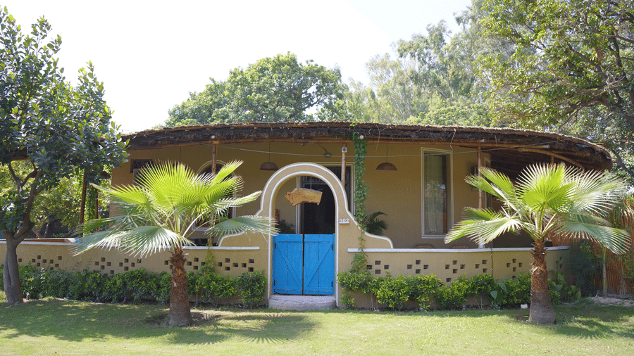 Exterior view of ethnic room  at Themis Mudhouse Nature Retreat Resort