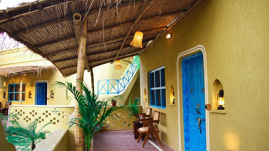 a view of the classic villa balcony at Themis Mudhouse - A Nature's Retreat Resort & Wellness