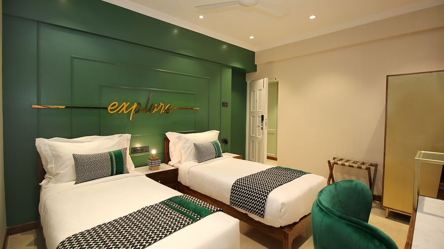 elegant rooms with modern interiors and twin beds at theory9
