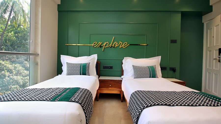 rooms with twin beds at theory9 bandra