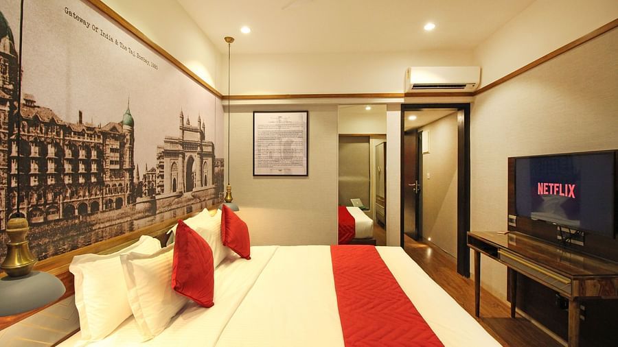 king size bed with modern amenities at theory9 khar