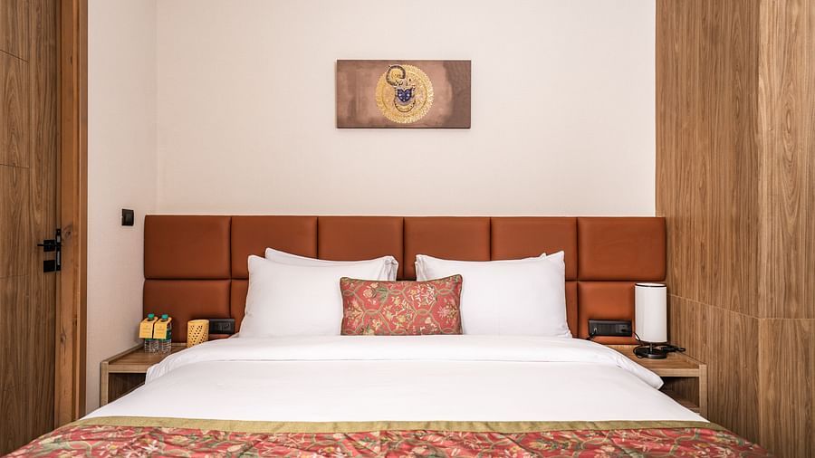 a double bed in the presidential suite at Triptam Hotel, Vrindavan