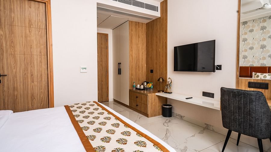 interior of one of the bedrooms in the presidential suite at Triptam Hotel, Vrindavan