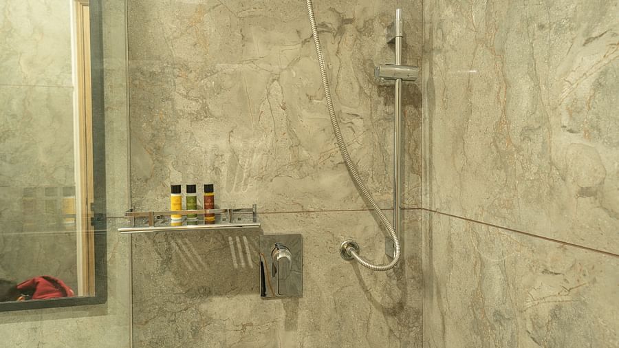 view of the shower in the presidential suite at Triptam Hotel, Vrindavan