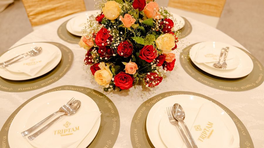 a table set up for an event at Prangan banquet hall at Triptam Hotel, Vrindavan