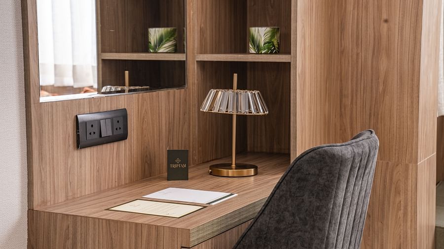 work desk and chair in the presidential suite at Triptam Hotel, Vrindavan