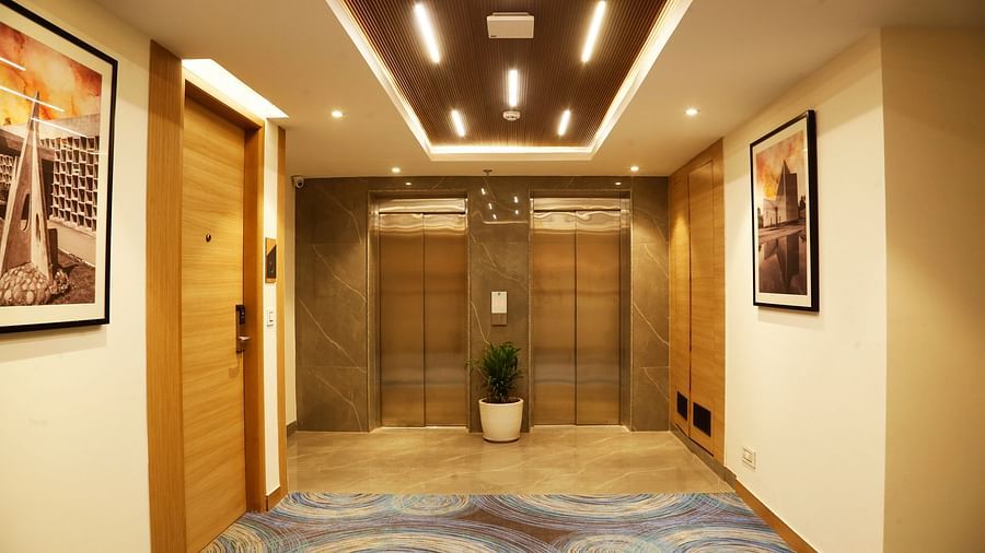 An image of the two lifts at our hotel seen from the corridor - Tulip Inn, Zirakpur