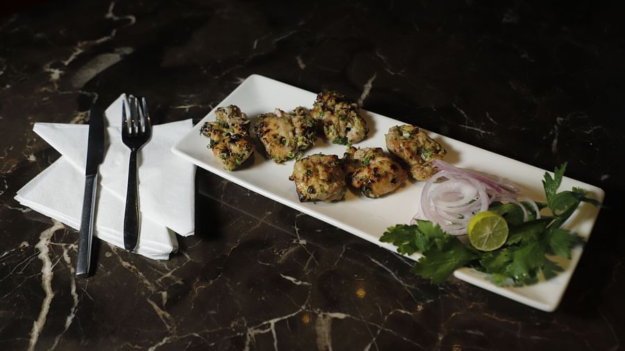 chicken malai tikka kebab at a restaurant table2