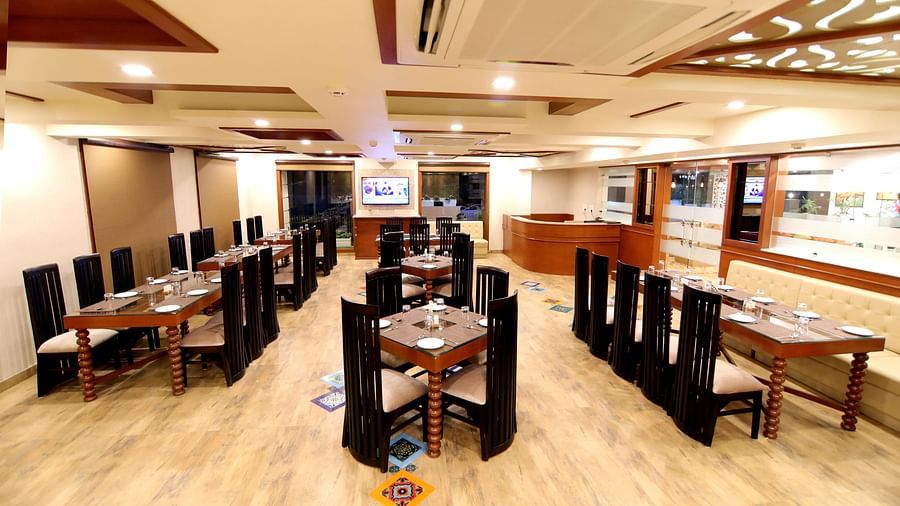 The seating arrangement at the Restaurant 2 - Udman Hotel Haridwar