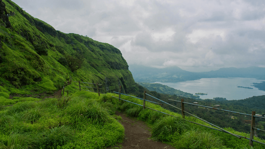 Panoramic view from a trek to Lohagad Fort, one of the popular things to do in Lonavala, under a cloudy sky