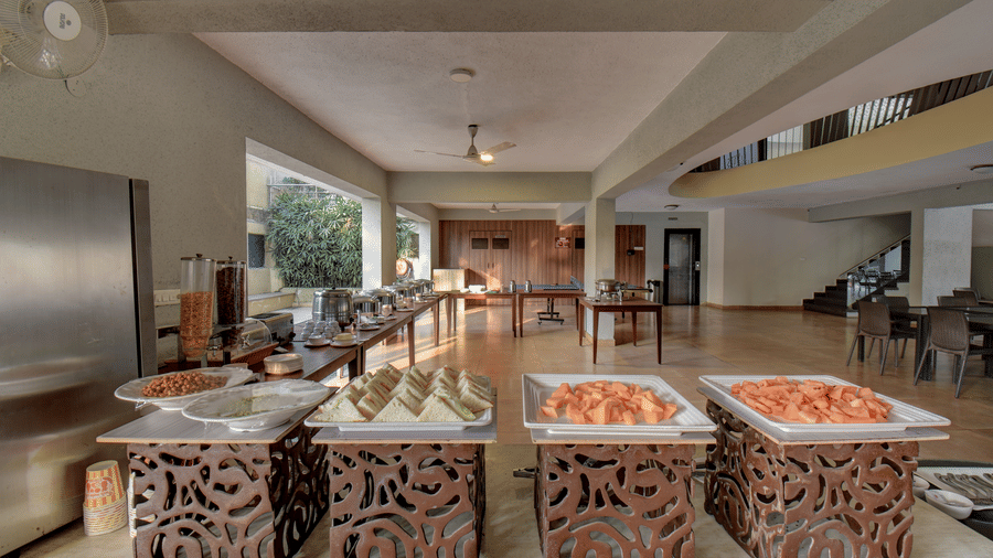 Buffet setup with a variety of dishes in the restaurant at VITS Lonavala.